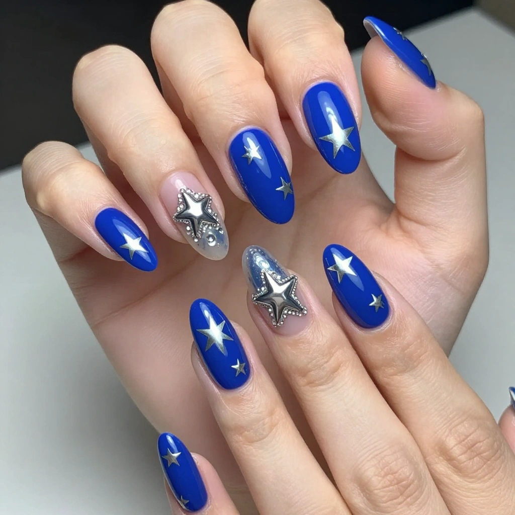 Blue Stiletto Nails with Chrome Star Details